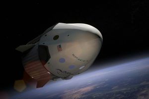 A SpaceX Dragon spacecraft orbiting Earth, captured in vivid detail against space.
